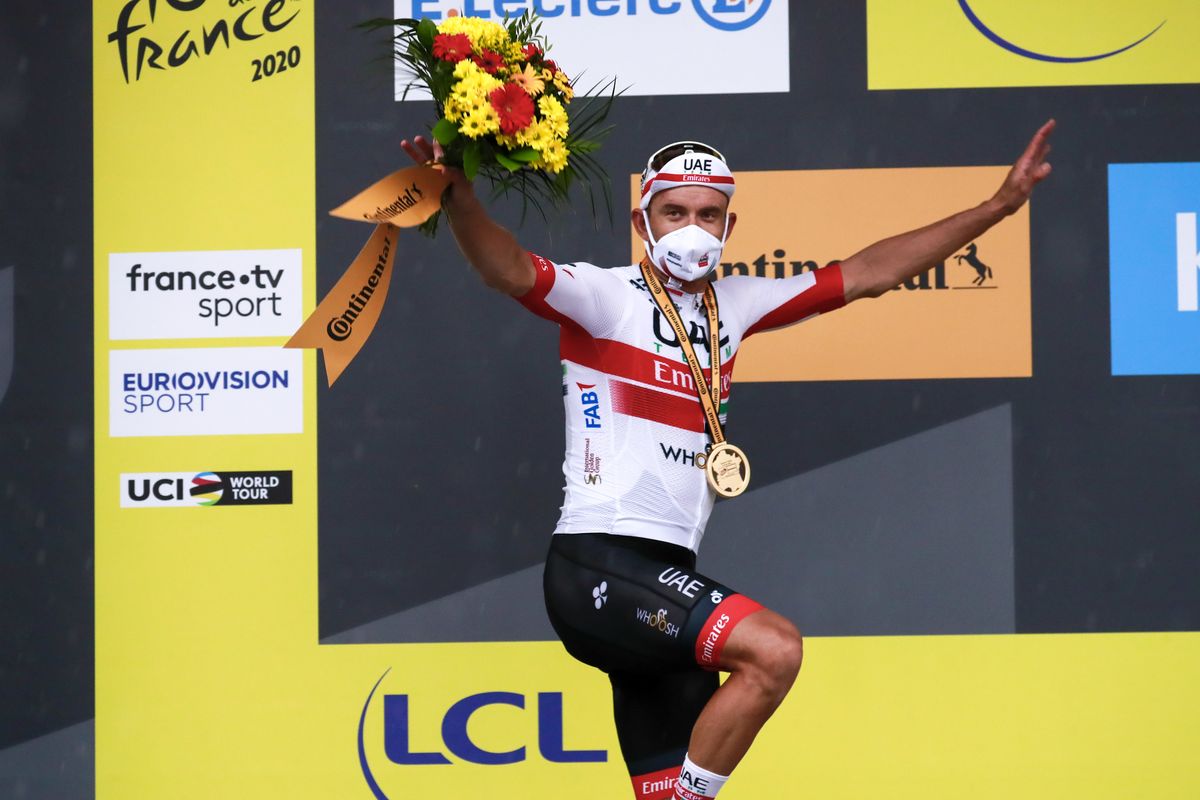 Alexander Kristoff of Norway celebrates on the podium after winning the first stage of the Tour de France cycling race over 156 kilometers (97 miles) with start and finish in Nice, southern France, Saturday, Aug. 29, 2020.  (Christophe Petit-Tesson)