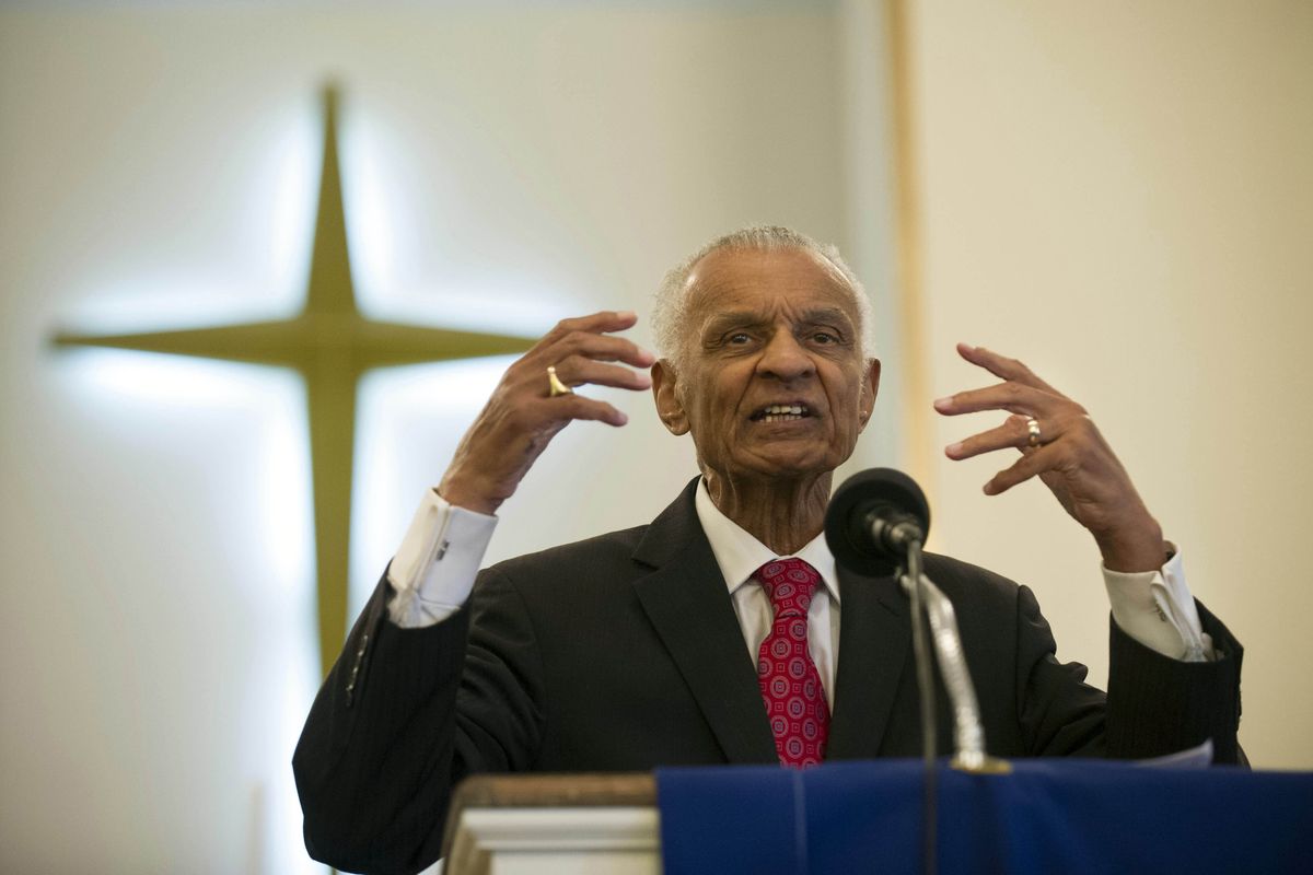 FILE - In this June 19, 2014, file photo, Civil Rights pioneer Rev. C.T. Vivian preaches during a commemoration of the 50th anniversary of the Civil Rights Act in Knoxville, Tenn. The Rev. C.T. Vivian, a civil rights veteran who worked alongside the Rev. Martin Luther King Jr. and served as head of the organization co-founded by the civil rights icon, has died at home in Atlanta of natural causes Friday morning, July 17, 2020, his friend and business partner Don Rivers confirmed to The Associated Press. Vivian was 95.  (Paul Efird)