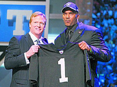
As expected, Raiders made JaMarcus Russell top pick.
 (Associated Press / The Spokesman-Review)