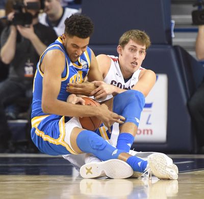 Gonzaga’s Kyle Wiltjer, right, fights UCLA’s Jonah Bolden, left, for a critical turnover in the second half Saturday, Dec. 12, 2015 at McCarthey Athletic Center. UCLA edged the Zags 71-66. (Jesse Tinsley / The Spokesman-Review)