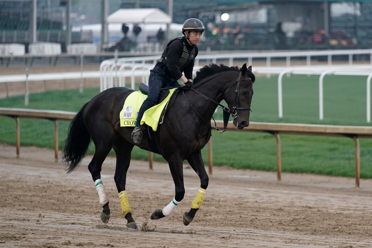 Crown Pride, ridden by exercise rider Maso Matsuda during a workout Friday at Churchill Downs, could become the first horse from Japan to win the Kentucky Derby.  (Associated Press)