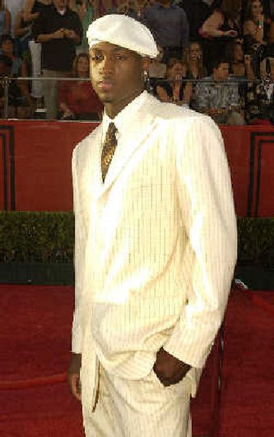 
Man-about-town and red-hot NBA commodity Dwyane Wade of the Miami Heat arrives in style at last July's Espy Awards in Los Angeles. 
 (Associated Press / The Spokesman-Review)
