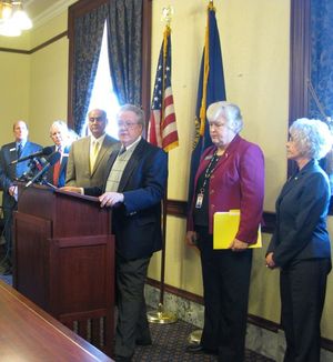 Democratic lawmakers unveil draft legislation Thursday establishing an independent Idaho ethics commission; from left are Sens. Elliot Werk, Les Bock and Edgar Malepeai, and Reps. John Rusche, Phylis King and Elfreda Higgins. (Betsy Russell)