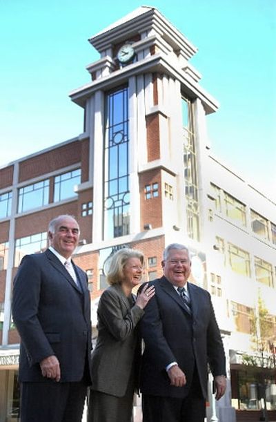 
Harold Gilkey, left, CEO and chairman of Sterling Financial Corp.; Heidi Stanley, chief operating officer for Sterling Savings Bank; and William Zuppe, chairman and CEO of Sterling Savings Bank, share a laugh in front of Sterling Financial Corp. headquarters in downtown Spokane.
 (Jed Conklin / The Spokesman-Review)
