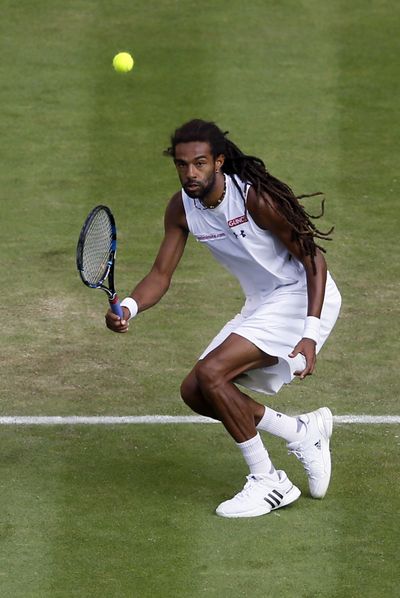 Dustin Brown of Germany took out Rafael Nadal with heavy serve-and-volley play. (Associated Press)