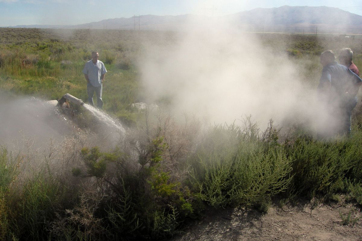 Workers at U.S. Geothermal’s Raft River power plant in southern Idaho monitor flows from one of the power plant’s deep, natural hot water wells.