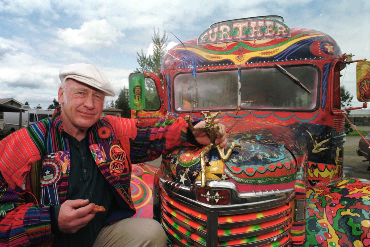 Author Ken Kesey poses in April 1997 with his bus “Further,” a descendant of the vehicle that carried him and the Merry Pranksters on the 1964 trip immortalized in a Tom Wolfe book, in Springfield, Ore. (Associated Press)