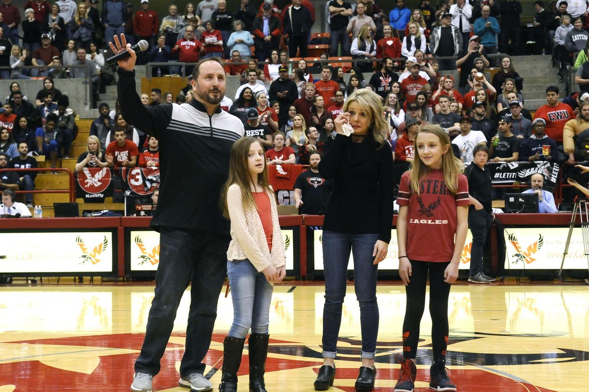 Former Eastern Washington Eagles football coach Beau Baldwin is honored during halftime of the game against the Idaho Vandals at Reese Court on Friday, Feb. 17, 2017, in Cheney. (Special to The Spokesman-Review / James Snook)