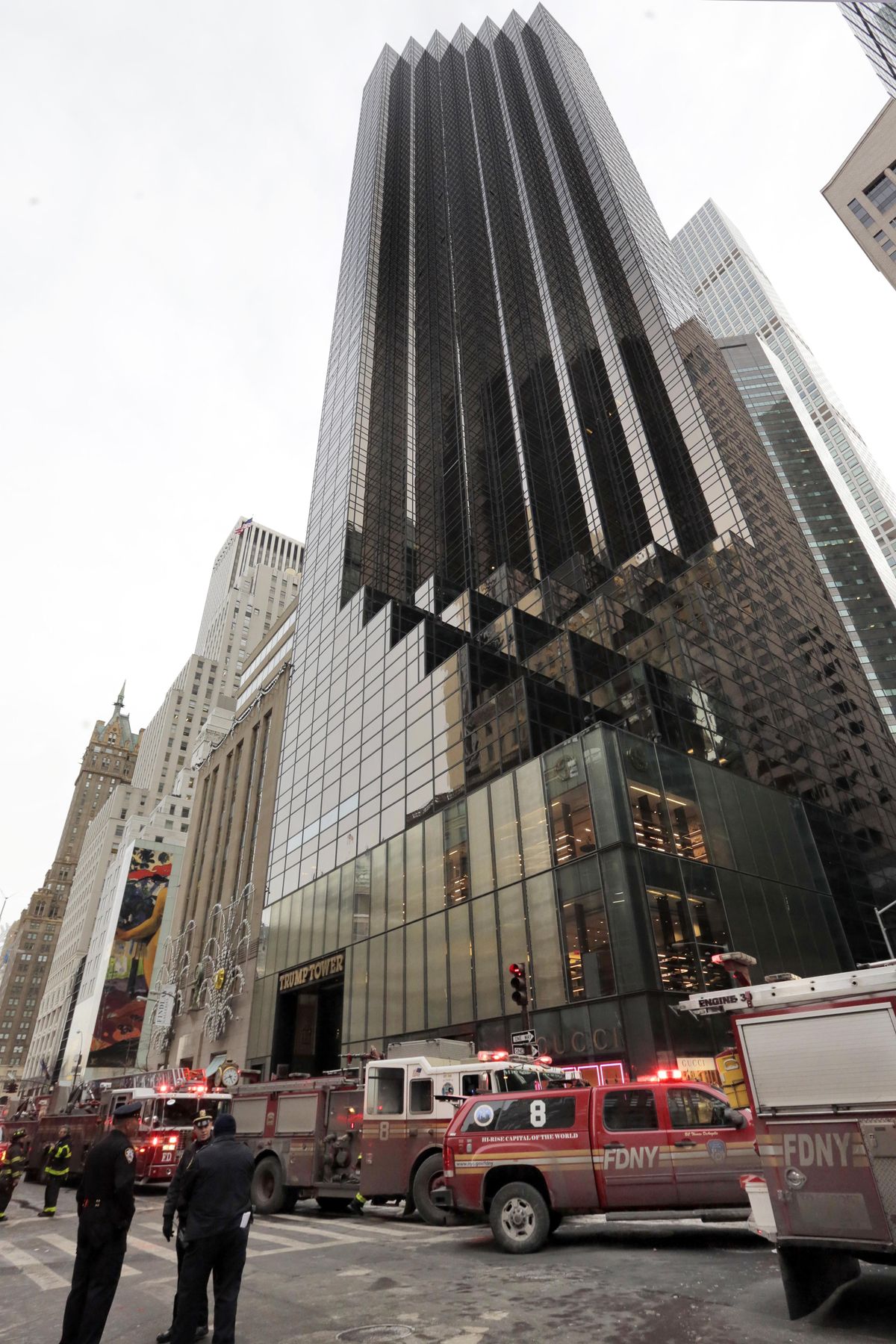 New York City Fire Department vehicles sit on Fifth Avenue in front of Trump Tower, in New York, Monday, Jan. 8, 2018. The department said a fire started around 7 a.m. Monday in the heating and air conditioning system of the building. (Richard Drew / AP)