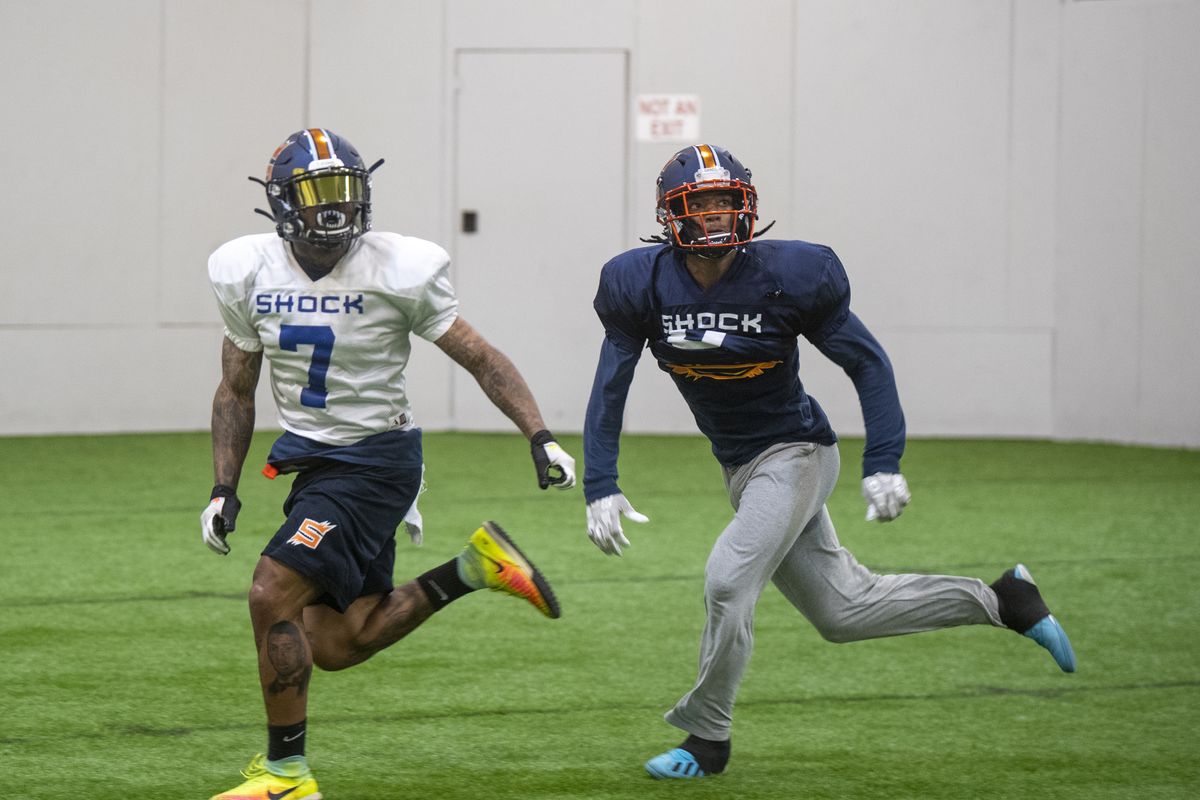 Spokane Shock receiver Troy Evans Jr., left, battles with defensive back Dominick Sanders for a pass during a May 3 practice in Idaho.  (JESSE TINSLEY/ THE SPOKESMAN-REVIEW)