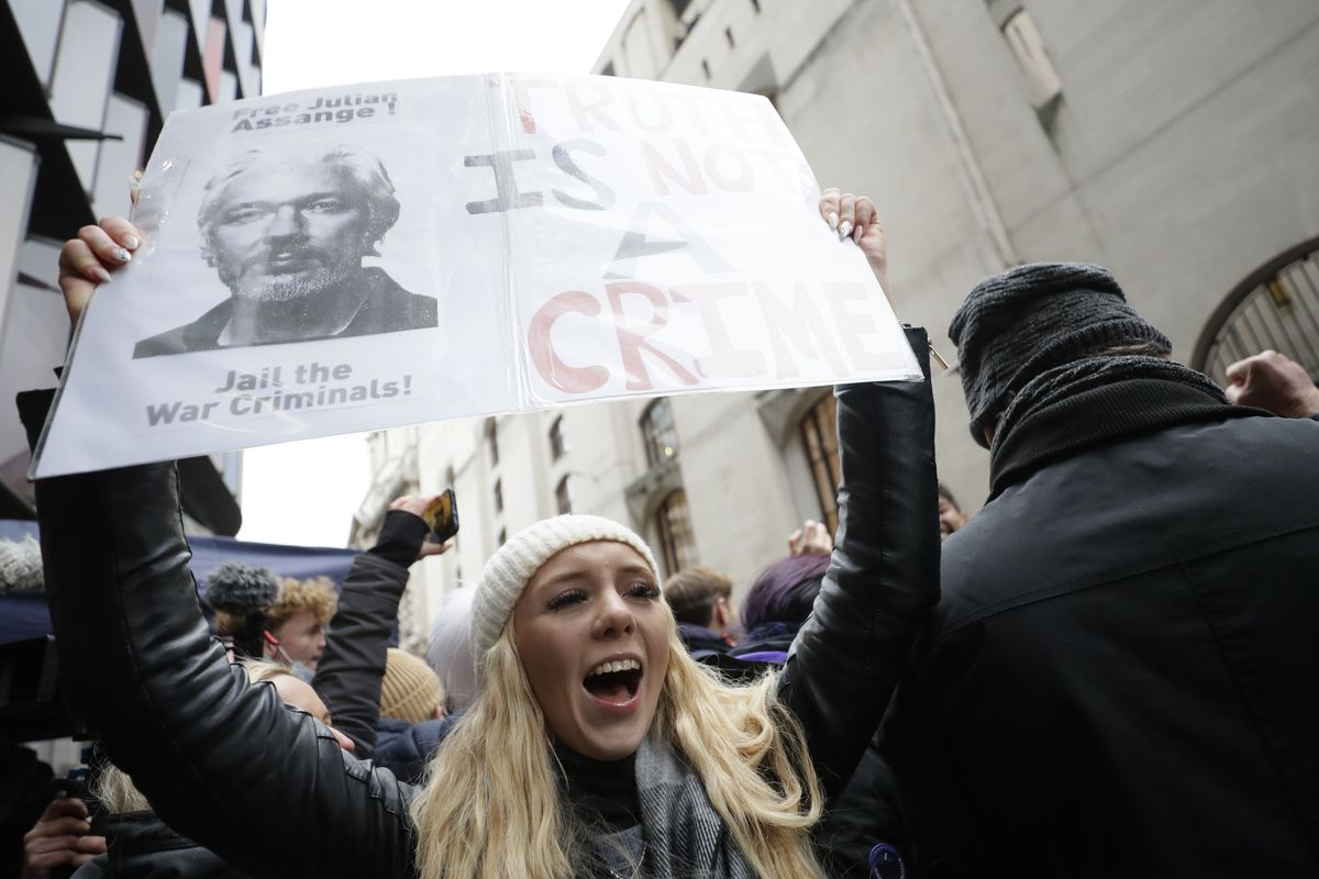 A Julian Assange supporter reacts to the ruling that Assange will not be extradited to the US. outside the Old Bailey in London, Monday, Jan. 4, 2021. Judge Vanessa Baraitser has ruled that Julian Assange cannot be extradited to the US. because of concerns about his mental health. Assange had been charged under the US's 1917 Espionage Act for "unlawfully obtaining and disclosing classified documents related to the national defence".  (Kirsty Wigglesworth)
