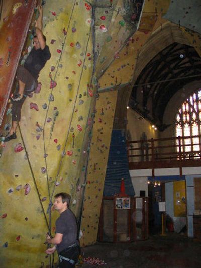 
A man practices rock climbing in the Bristol Climbing Center, which is run inside the converted 15th-century St. Werburgh's Church.
 (Washington Post / The Spokesman-Review)