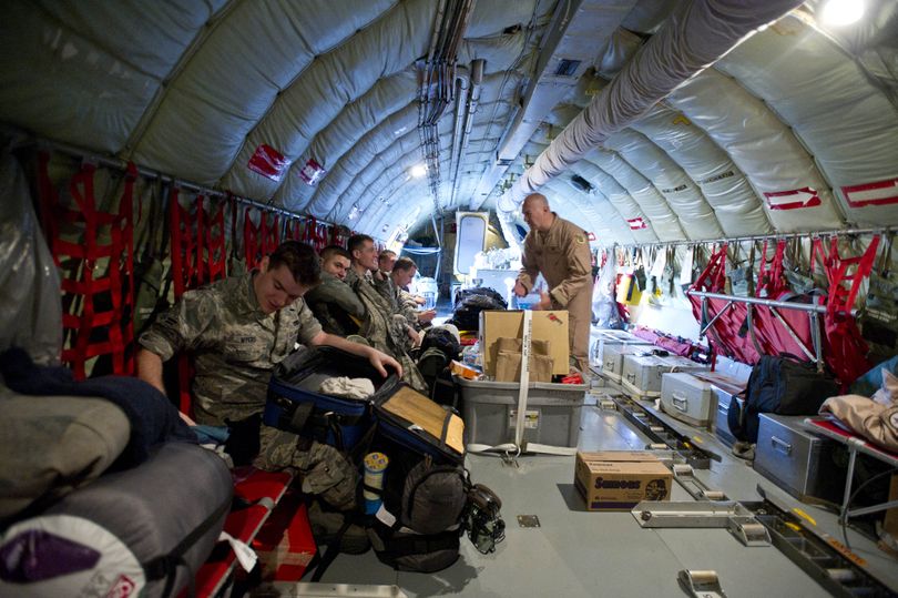 Airmen with the 92nd  Air Refueling Wing at Fairchild Air Force Base strap in for a seventeen hour flight to the Manas Transit Center in  Kyrgyzstan. The aircrew and five maintainers flew to Kyrgyzstan aboard a Fairchild KC-135R Stratotanker refueling aircraft for a five-month deployment. (Colin Mulvany / The Spokesman-Review)