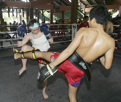 Eliza Bates trains at a Thai boxing camp outside Bangkok, Thailand. She took the 10-day course, which includes boarding at the camp, as a way of getting fit.  (Associated Press / The Spokesman-Review)