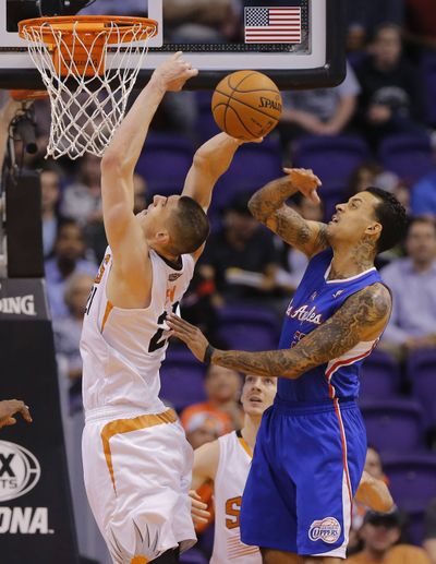 Clippers' Matt Barnes, right, had 28 points in victory. (Associated Press)
