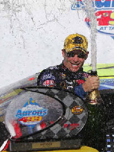 
Jeff Gordon celebrates winning the Aaron's 499.
 (Associated Press / The Spokesman-Review)