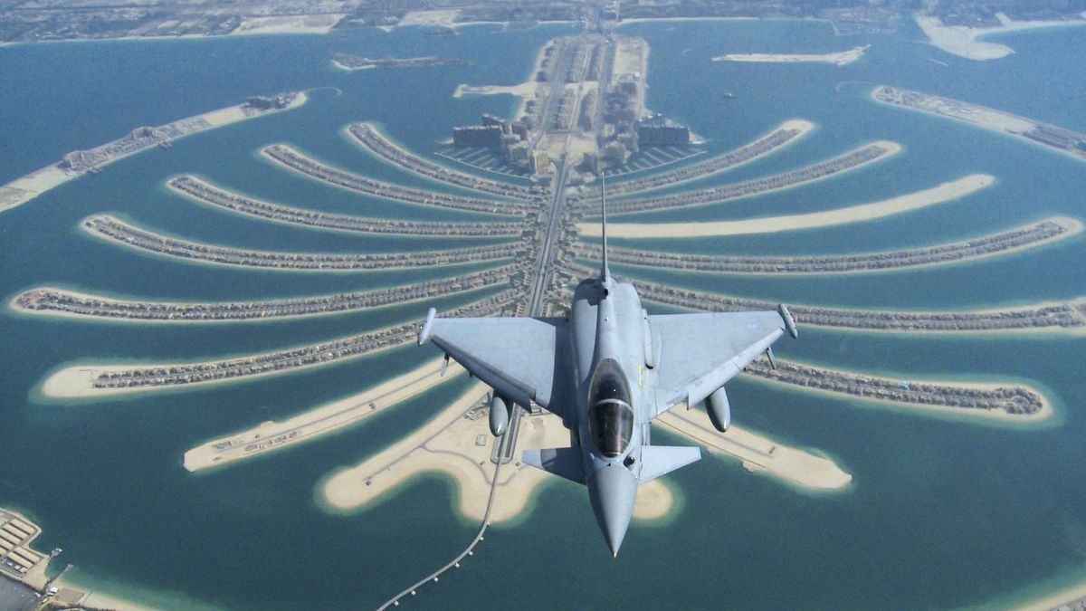 A Royal Air Force fighter flies over the Jumeirah Palm in Dubai while attending an air show Tuesday.