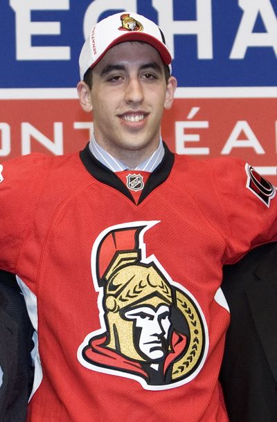 Jared Cowen poses at the NHL draft Friday wearing an Ottawa Senators jersey. He is the fifth Spokane Chief to be drafted in the first round, joining Pat Falloon, Brad Ference, Michael Grabner and Ty Jones.  (Associated Press / The Spokesman-Review)