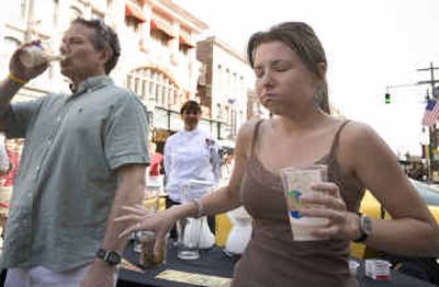 
In this photo provided by Universal Orlando, Jeff Peterson and his daughter Rachel, both from Albany, N.Y., react to the flavor of a 