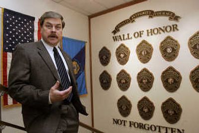 
Alaska Public Safety Commissioner Walt Monegan, a member of the Village Public Safety Officer task force, talks about the state-funded program at his office in Anchorage. Associated Press
 (Associated Press / The Spokesman-Review)