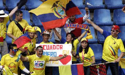 
Ecuadorian fans celebrate after their 3-0 win over Costa Rica. 
 (Associated Press / The Spokesman-Review)