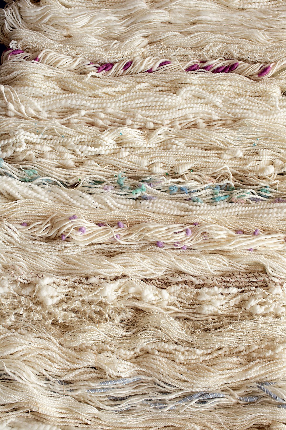 This photo provided by Storey Publishing shows handspun yarn from “The Spinner’s Book of Yarn Designs: Techniques for Creating 80 Yarns,” by author Sarah Anderson. (Associated Press)