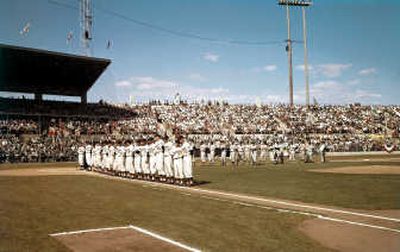 
The Spokane Indians baseball team and the team from Salt Lake City line up before the National Anthem on opening day of the 1960 season. The Spokesman-Review archive
 (File photos  archive / The Spokesman-Review)