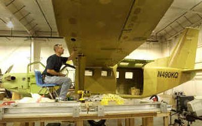 Chris Klynstra works on the Kodiak, a large single-engine bush plane being designed and built by Quest Aircraft, a company in Sandpoint. 
 (Jesse Tinsley / The Spokesman-Review)