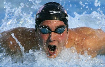 
USA's Ian Crocker comes up for air to win the gold medal and break the world record in the men's 100-meter butterfly final at the World Swimming Championships Saturday in Montreal.
 (Associated Press / The Spokesman-Review)
