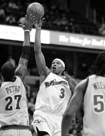 
Caron Butler (3) triggered the Washington attack against Seattle. 
 (Associated Press / The Spokesman-Review)