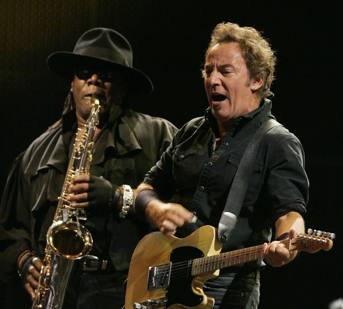 In this July 17, 2008 file photo, Bruce Springsteen, right, performs alongside Clarence Clemons on saxophone during a concert in Madrid. A spokeswoman for Bruce Springsteen and the E Street Band says saxophone player Clarence Clemons has died in Florida at age 69 on Saturday, June 18, 2011. 
  (Paul White / The Associated Press)