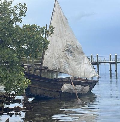 A migrant sailboat rests on the shores of Tavernier, in the Upper Florida Keys.  (U.S. Border Patrol/TNS/TNS)