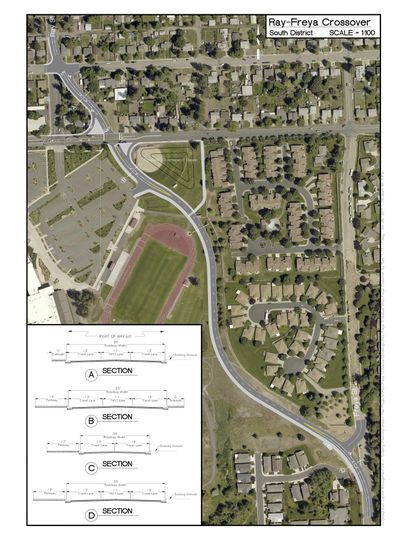 A rendering of the proposed Ray-Freya connector near Ferris High School, a proposal that has existed in some form since 1966 in planning documents prepared by the city. The surrounding neighborhood has asked the city to avoid building the road, though it appears in a draft of a 20-year planning document the Spokane City Council will consider next Monday. (Spokane City Planning Department)