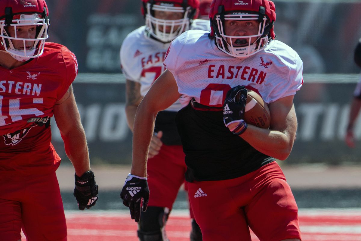 After a short reception, tight end Chris Johnson runs the ball during EWU’s final football scrimmage, Friday, August 26, 2022, on Roos Field in Cheney.  (COLIN MULVANY/THE SPOKESMAN-REVIEW)