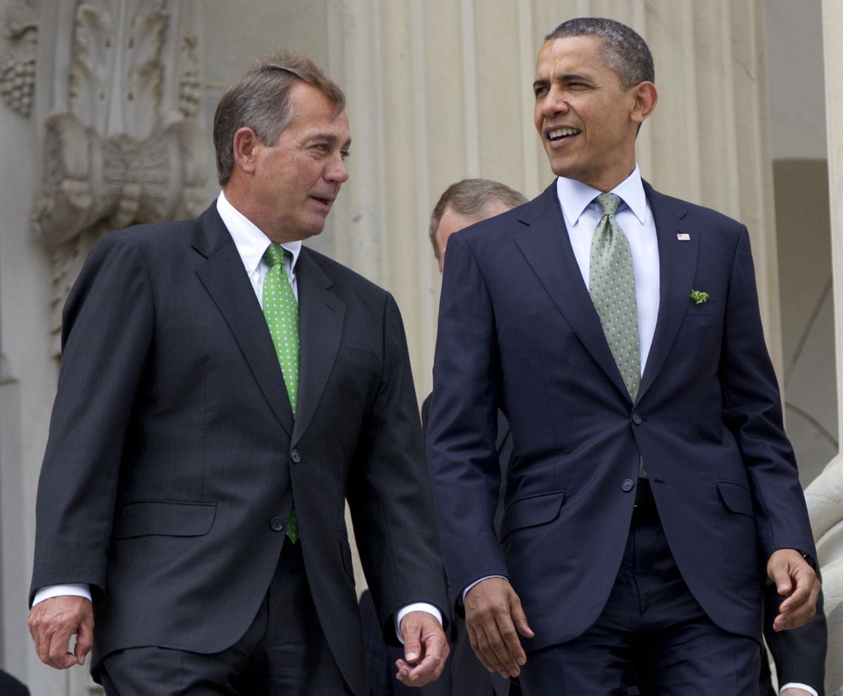 House Speaker John Boehner of Ohio and President Barack Obama walk down the steps of the Capitol in Washington in March. (Associated Press)