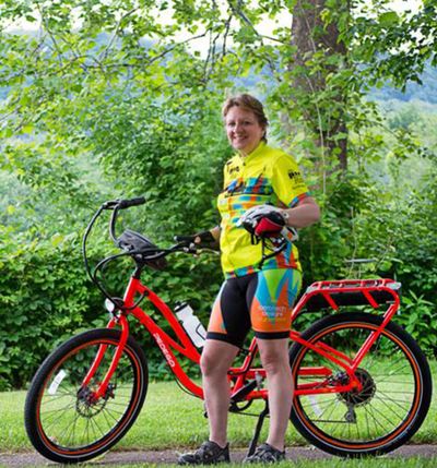 Cathy Rogers, of Pittsburg, is attempting to bicycle across the USA this summer with the help of an electric bicycle.