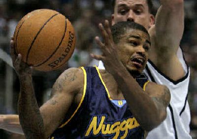 
Point guard Earl Watson is headed back to Seattle after a stint in Denver. 
 (Associated Press / The Spokesman-Review)