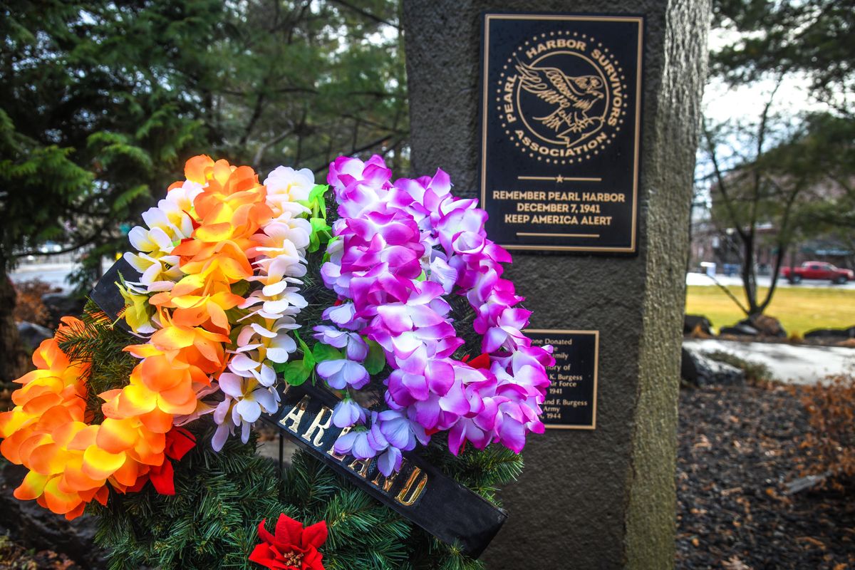 Hawaiian leis adorn a wreath honoring Ray Garland, the final living serviceman in the Inland Northwest present during the Japanese attack who had also been a member of the Lilac City chapter of the Pearl Harbor Survivors Association. Garland died in April at age 96. A Pearl Harbor commemoration ceremony was held the Spokane Memorial Arena, Saturday, Dec. 7, 2019. (Dan Pelle / The Spokesman-Review)