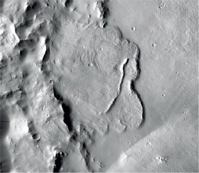 This undated photo provided by the European Space Agency, ESA, shows the surface of the Mars. Scientists say images of Martian craters taken by European and American space probes show there likely once was a planet-wide system of underground lakes. (NASA/JPL-Caltech/MSSS / Associated Press)