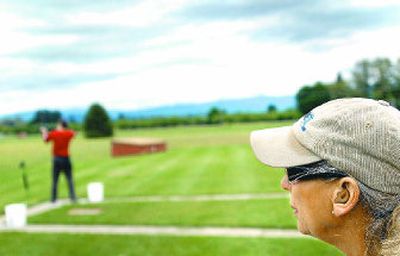 
Ann Isenberg of the Coeur d'Alene Skeet & Trap Club keeps score on Thursday  for trapshooters. Isenberg and the club will host a Cast-N-Blast this weekend in Hayden.  
 (Brian Plonka / The Spokesman-Review)