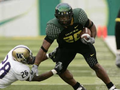 
Jonathan Stewart rushed for 159 yards and two TDs as Oregon defeated Washington last year. Associated Press
 (Associated Press / The Spokesman-Review)