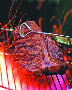
It's the perfect time to fire up the barbecue and throw on a juicy T-bone. 
 (Los Angeles Times / The Spokesman-Review)