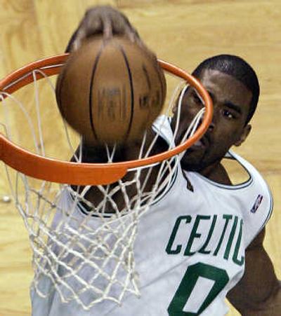 
Associated Press Celtics forward Leon Powe punched in a 21-point performance in Game 2, including back-to-back dunks in the third quarter.
 (Associated Press / The Spokesman-Review)