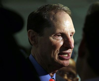 U.S. Sen. Ron Wyden, D-Ore., speaks after a news conference in Portland, Ore., on Sept. 25, 2015. Wyden is pushing for more answers on why doctors and patient advocates with financial ties to the pharmaceutical industry came to serve on a panel that advises the federal government on pain issues. (Don Ryan / Associated Press)