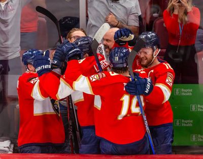 The Florida Panthers’ Matthew Tkachuk (19) and Aleksander Barkov (16) celebrate after teammates after their team’s win against the New York Rangers in Game 6 during the Eastern Conference Finals at the Amerant Bank Arena on Saturday in Sunrise, Florida.  (Tribune News Service)