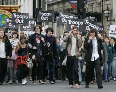 
Anti-war protesters march along a central London street,  near the Houses of Parliament, Monday. Associated Press
 (Associated Press / The Spokesman-Review)