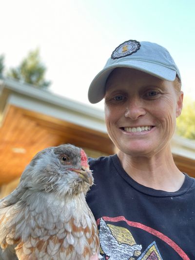 Tracy Simmons holds her chicken, Agnes.  (Tracy Simmons/FāVS News)