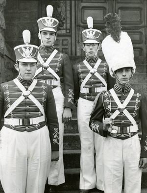 Archive find of the day: In this 1940 photo, resplendent in their new uniforms of blue and white, with gold cord and snappy Hussar caps with plumes , the 50 members of the Gonzaga pep band must be reckoned with when it comes to judging a colorful marching unit. Left to right, are: Joseph McDonough, band master; Ernest Fairleigh, buisness manager; Carr McGarity, secretary-treasurer, and Al Thomas, drum major.  (Photo Archive/spokesman-review)