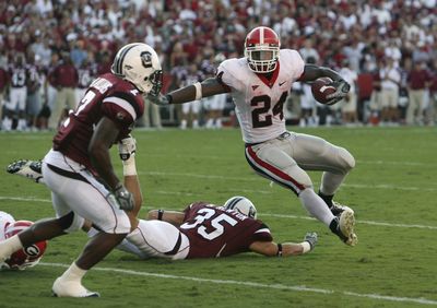 Knowshon Moreno (24) led No. 2 Georgia.  (Associated Press / The Spokesman-Review)