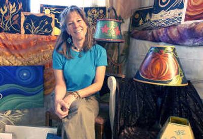 
Mica artist Gretchen Paukert will be featured on an upcoming episode of HGTV. Her medium is metal leaf and acrylic painting. She works on lamps, place mats, cards and bookmarks.
 (Photos by J. BART RAYNIAK / The Spokesman-Review)
